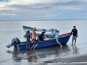 People entering a boat.