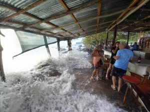 People in watery restaurant.