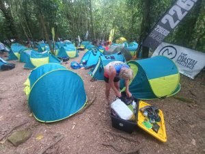 Tents in a field of the Coastal Challenge.